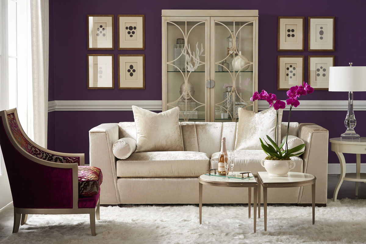 Living room with eggplant wall and Gigi sofa