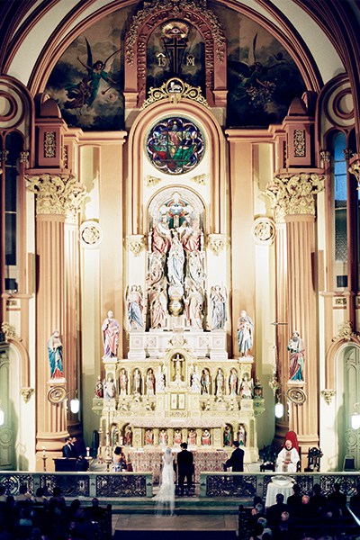 The couple celebrated a wedding Mass at the majestic baroque altar of St. Mary’s Assumption Church.