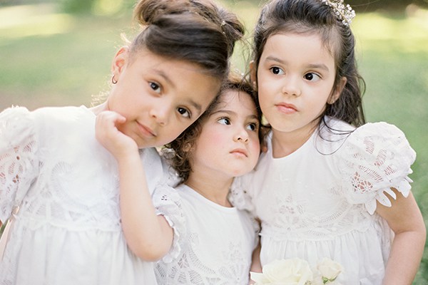 The flower girls wore dresses handmade with lace from vintage tablecloths.