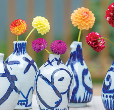 Frances Palmer's garden-grown dahlias displayed un her own handmade vases