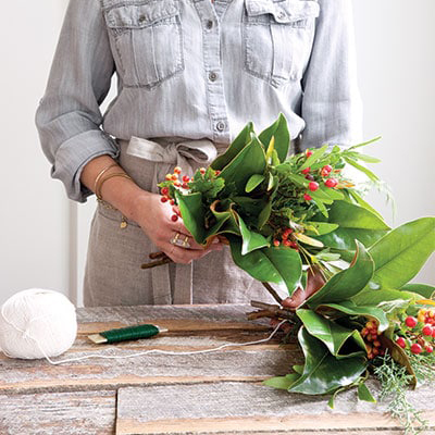 adding another greenery bundle to garland