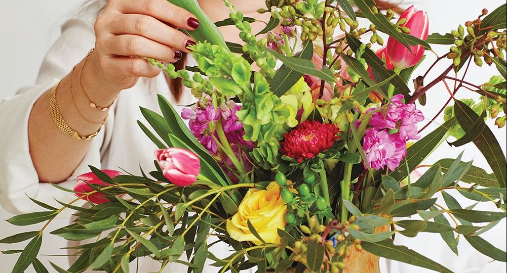 Arranging grocery store flowers, supermarket flower arrangements