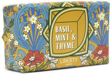 Bar of soap wrapped in a classic Liberty botanical-print paper