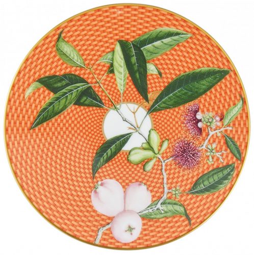 dessert plate with chrysanthemum-hued, geometric pattern behind a botanical motif 