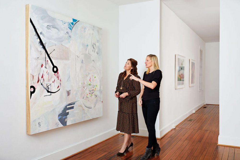 Amanda Nisbet looks at a large-scale modern painting at Reynolds Gallery, one of her favorite art galleries in Richmond, Virginea
