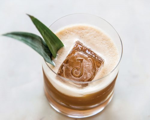 The Jasper's craft cocktails feature large ice-cubes bearing the bar's J insignia