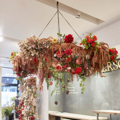 Flower chandelier with no floral foam created by FlowerSchool Master Florist Ingrid Carozzi and her workshop studens