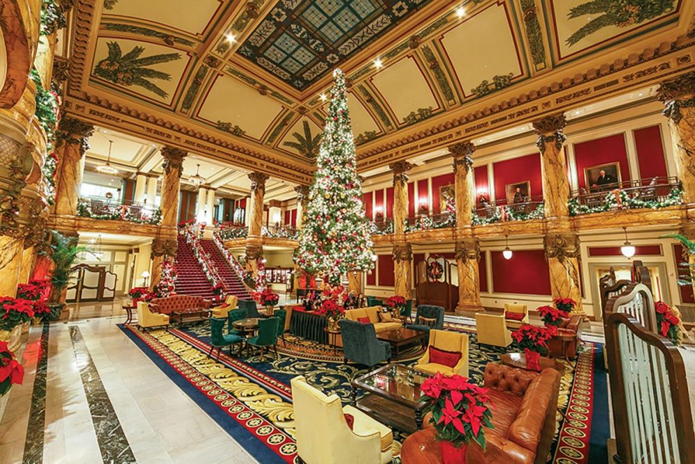The ornate lobby of The Jefferson hotel in Richmond, Virginia, is decorated for the holiday season with a soaring traditional Christmas tree