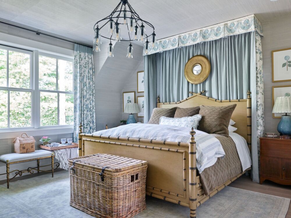 For this bedroom in the Cashiers showhouse, Nellie Ossi had Bob Christian paint the Mr. and Mrs. Howard Bambu bed. The bench is an antique covered in a Colefax fabric. Hanging above is the Sara chandelier by Canopy Designs, one of Nellie’s all-time favorite fixtures and is now discontinued. The art is custom Lauren Lachance botanicals.
