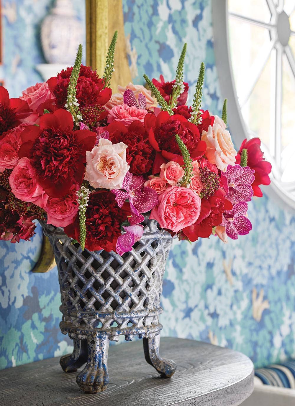 Pink and red arrangement of peonies, orchids and roses arranged by Michal Evans Flora for the Flower Atlanta Showhouse