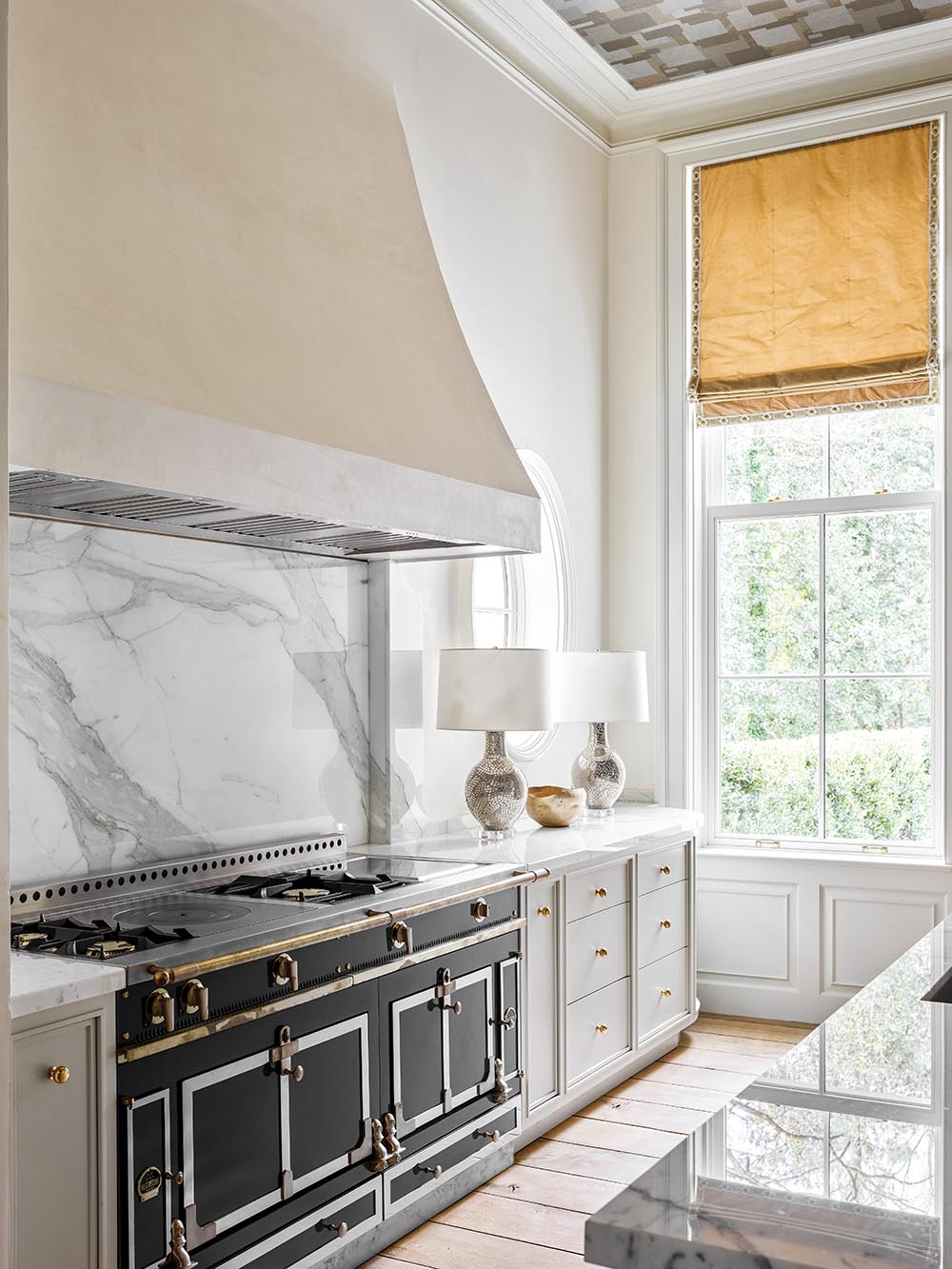FLOWER magazine Atlanta showhouse kitchen with custom LaCornue stove and marble backsplash.