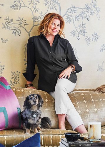 portrait of the interior design with her dog