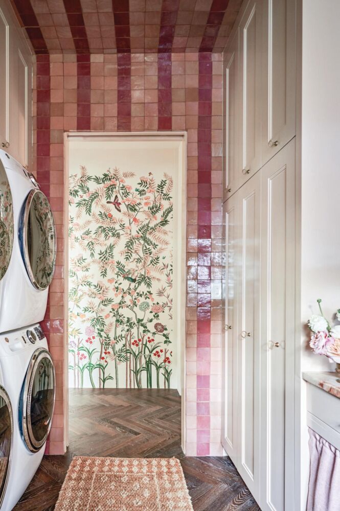 Amanda Smith Fowler designed laundry in the Flower magazine Baton Rouge showhouse. Pink and mauve tile on ceiling and wall. Liberty wallpaper in hallway.