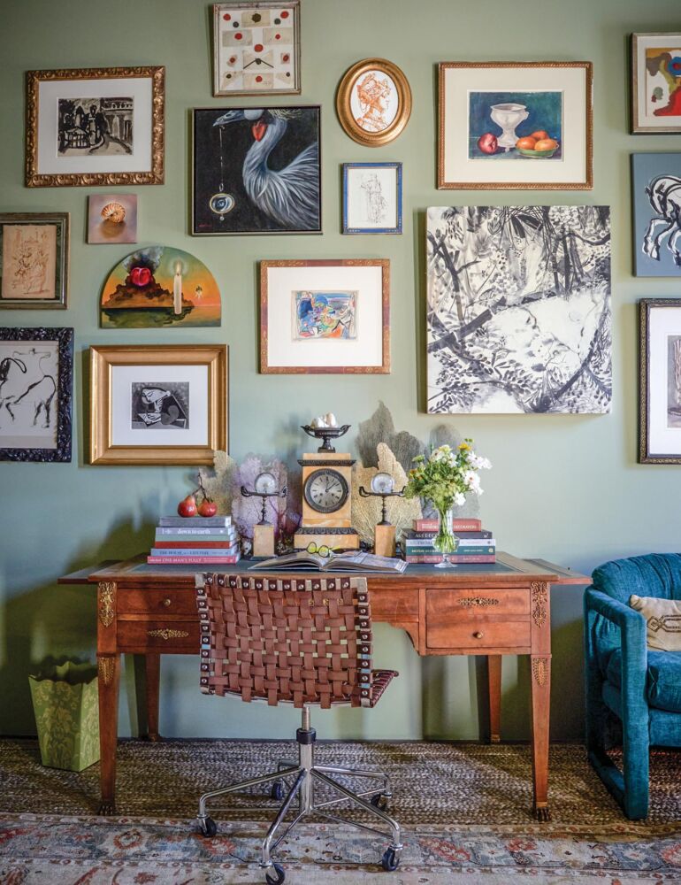 Desk in front of gallery wall in the Laura Roland designed study at the Flower magazine Baton Rouge showhouse.