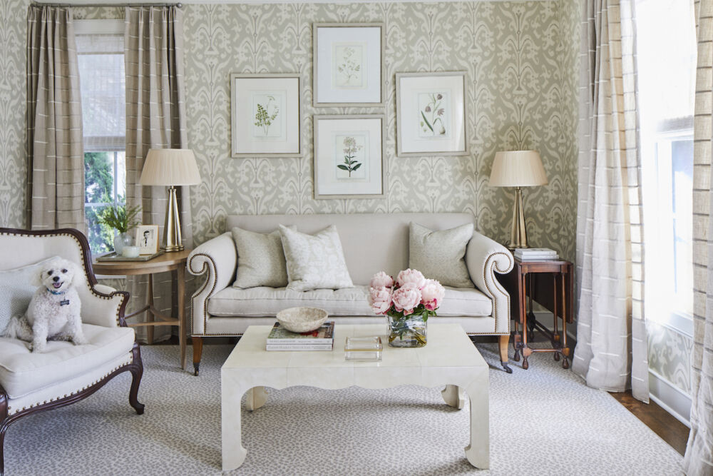 Sitting area with coffee table, the Paris from Mr. and Mrs. Howard for Sherrill. The rug is Kubra by Stark. Nellie Howard Ossi custom printed and framed the botanical art.