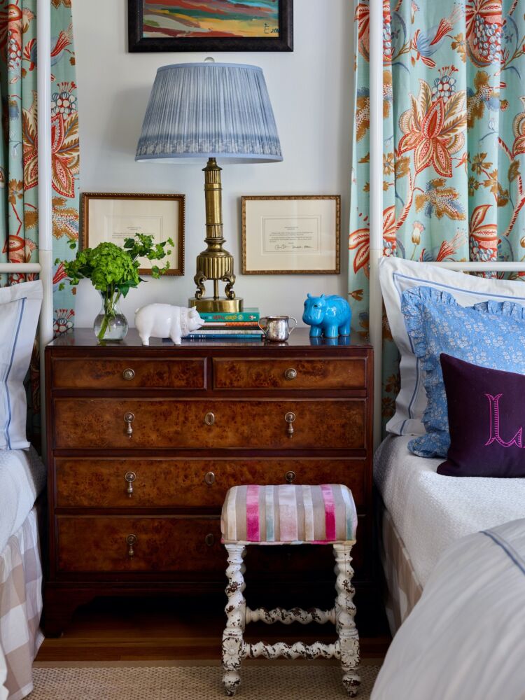 Blue lampshade used bedside in a bedroom designed by Gordon Dunning.
