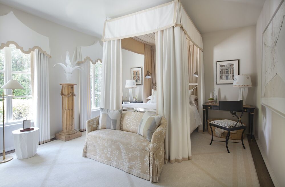 A glamorous primary bedroom in a symphony of neutrals designed by Dallas designer Josh Pickering
