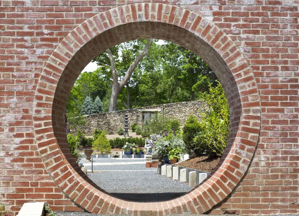 Moon Gate in a brick wall, opening into the Chinese Garden at Naumkeag