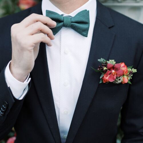 Red orchid pocket square boutonniere
