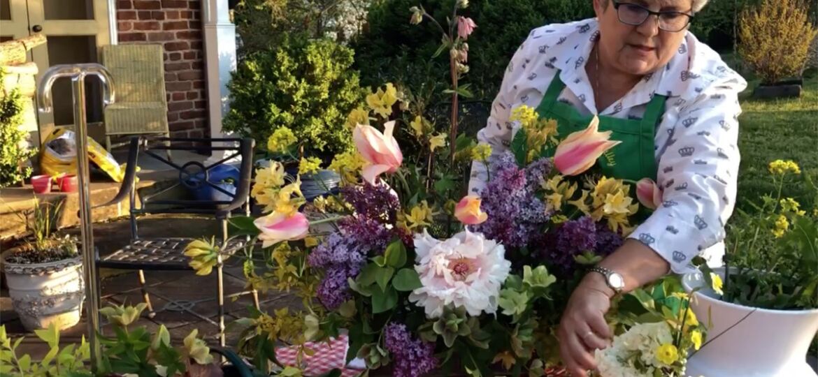 Jeanette Cadwallender of Garden Club of Virginia arranges spring flowers cut from her Fredericksburg garden