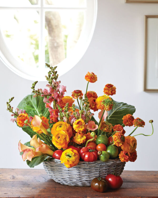 Yellow, orange, and red summer flower arrangement by Buffy Hargett Miller featuring tomatoes