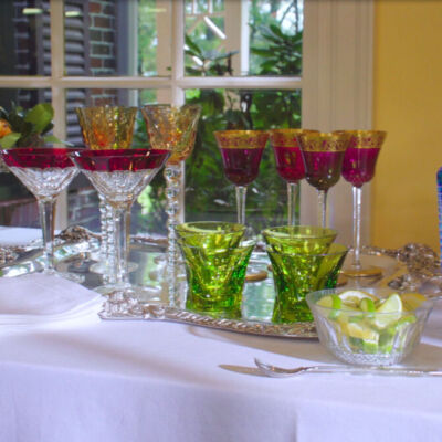 Holiday Bar featuring colorful glassware and silver pieces from Replacements