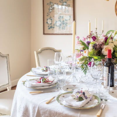 a light and airy dining room set for a Galentine's celebration in the home of Mary Spotswood in Frankin, Tennessee