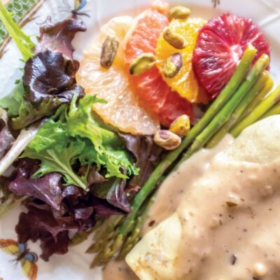 Chicken-and-mushroom crepes with asparagus, citrus salad, and mixed greens dressed in mustard vinaigrette