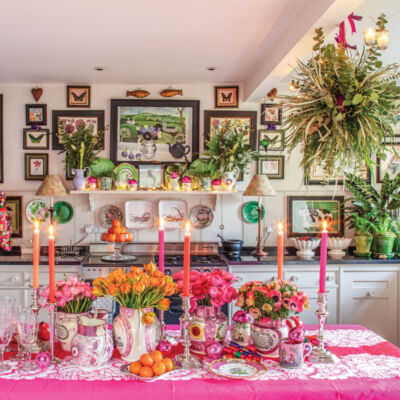 pink Christmas tabletop and kitchen decor by Butter Wakefield. KITCHEN - PINK TABLECLOTH, CANDLES, TULIPS, ANEMONES, RANUNCULUS