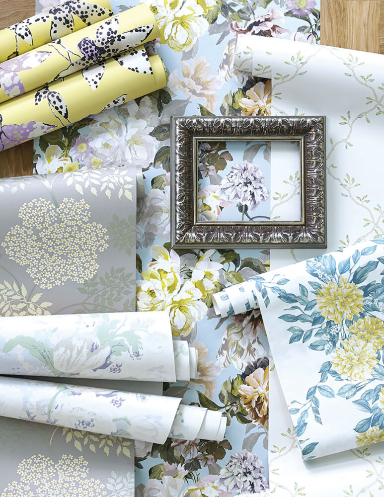 six patterns of floral wallpapers in colorways of soft yellow, pale blue, and silver with touches of purple