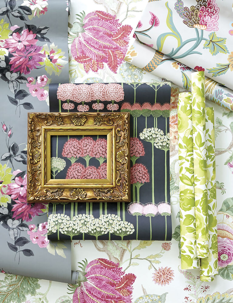 5 patterns of floral wallpapers featuring large blooms and predominantly bright pink and green colorways with white, gray and black backgrounds