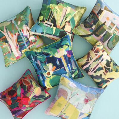 assorted colorful decorative pillows printed with nature-inspired artwork by Cynthia Wick in a new collection for Annie Selke Spring 2021 home decor collection