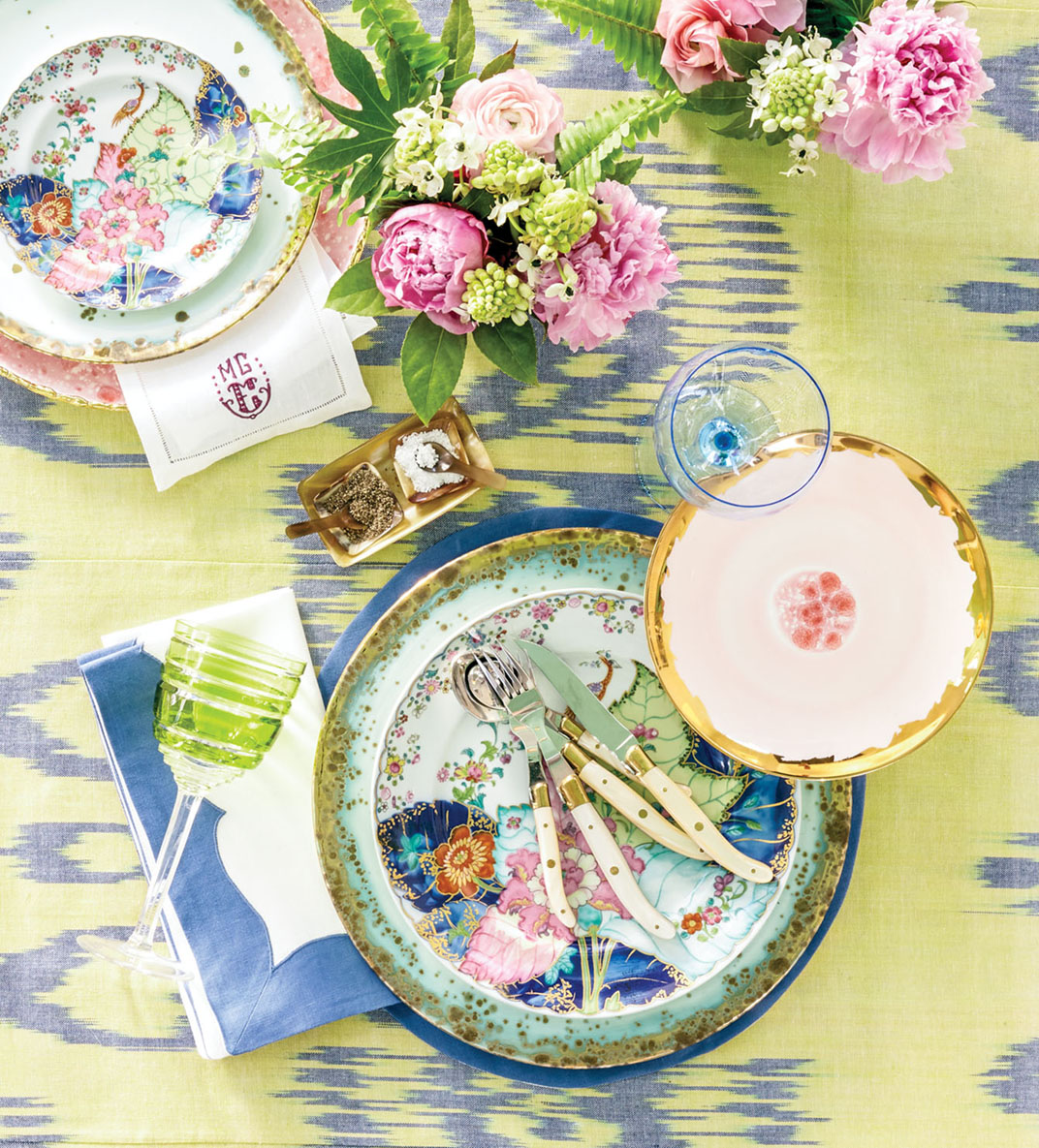 Spring table setting in pinks, yellow, and blues