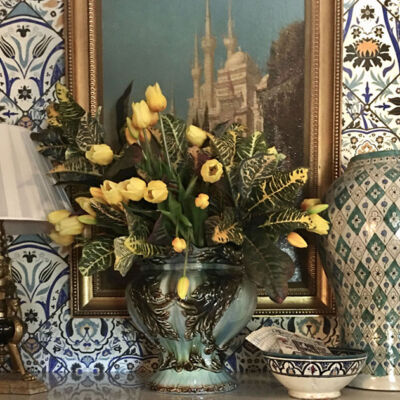 vase of yellow tulips in a vignette featuring Moroccan-inspired decor