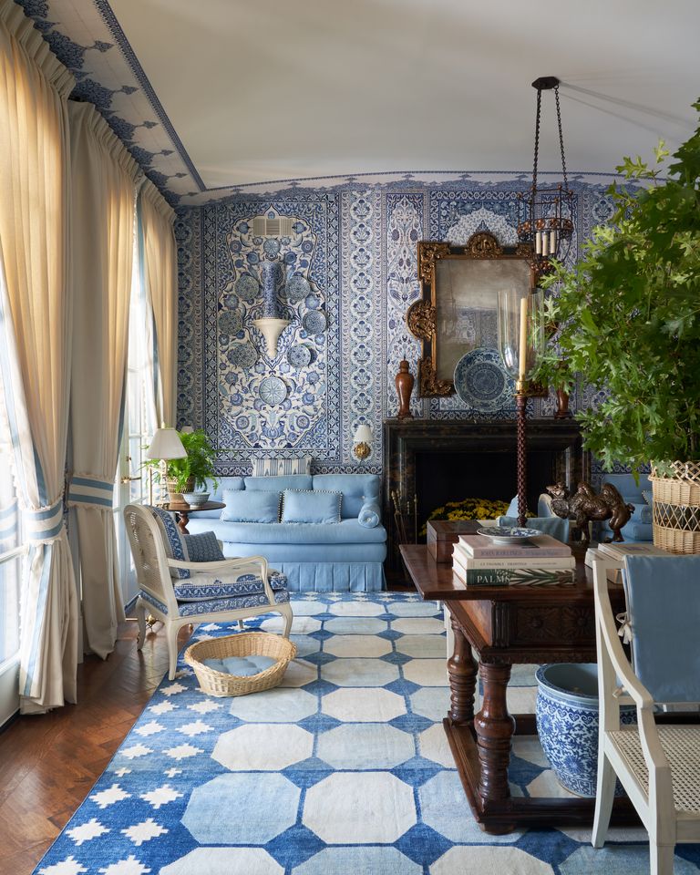 Blue and white living room designed by Mark D. Sykes