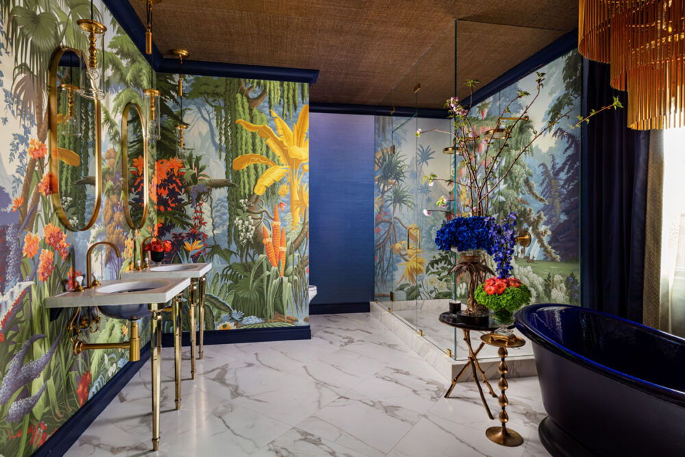 Alexandra Naranjo designed bathroom with bold tropical flower wallpaper at the Palm Beach Kips Bay Showhouse.
