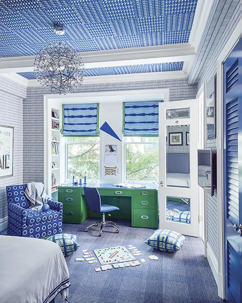 playful blue boys bedroom punctuated by a kelly green homework desk, designed by Phillip Thomas