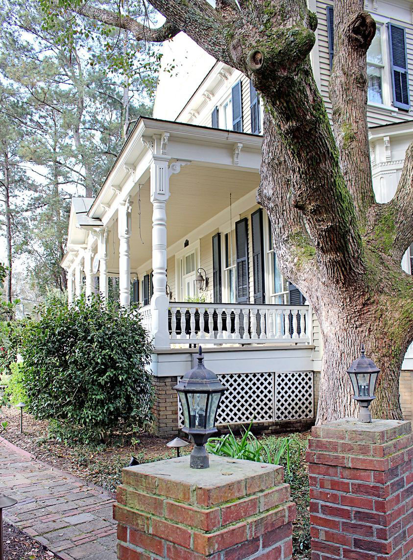 Flowertown Bed and Breakfast, a white frame house with a classic Southern front porch