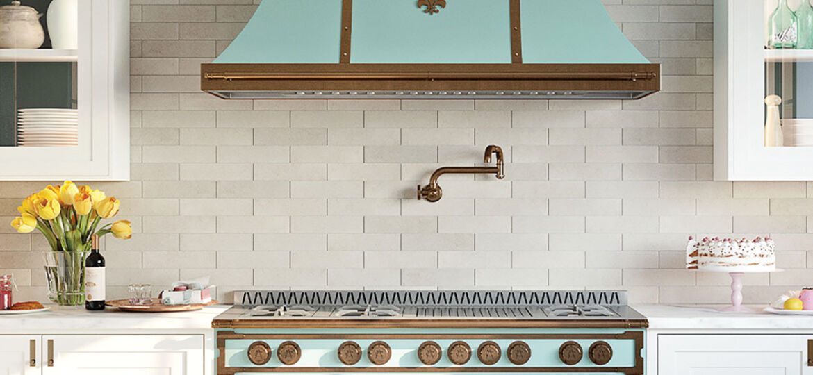 kitchen with white cabinets, white subway tile walls and backsplash, and retro style Tiffany blue French range and hood from L'Atelier Paris