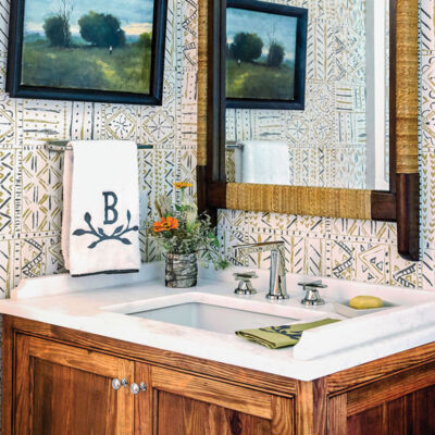 Flower magazine showhouse at Brierfield, guest bath sink vanity and mirror