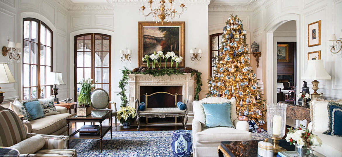 blue-and-white living room decor, Christmas tree, mantle garland, potted amaryllis flowers