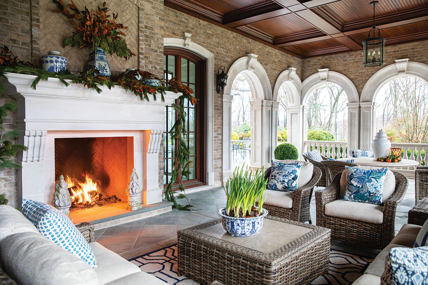 loggia, outdoor living spaces, fireplace, paperwhites, holiday mantle decor