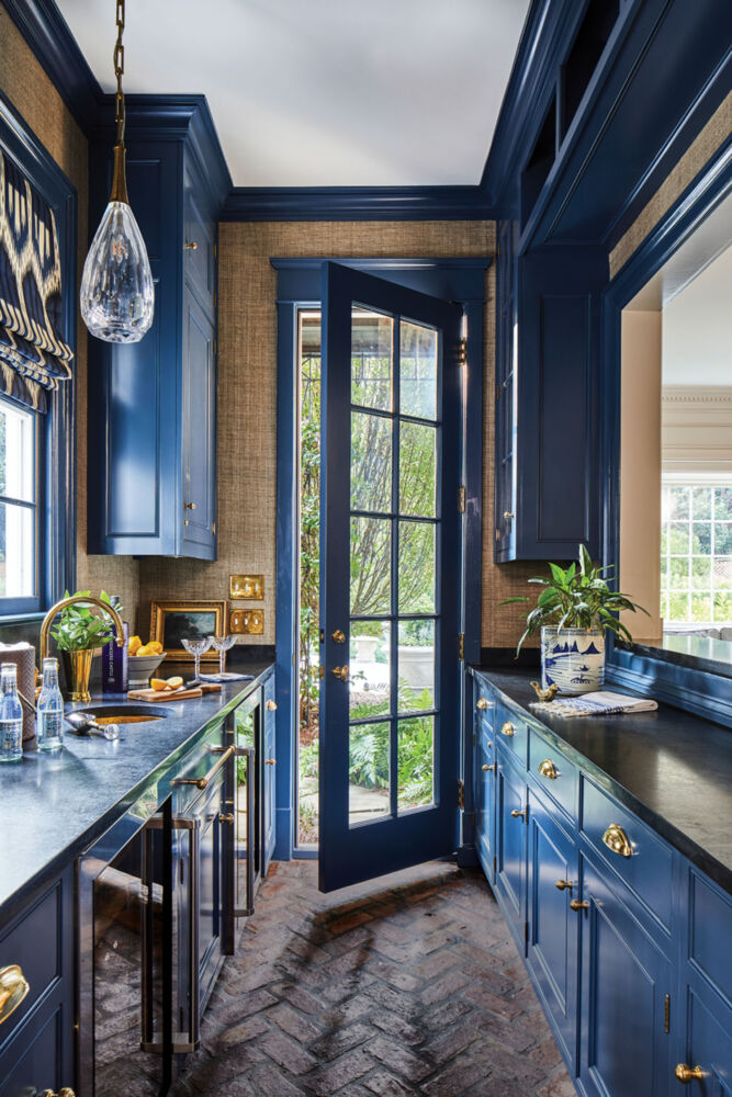 blue cabinets in a kitchen renovated by Mathews Design Group