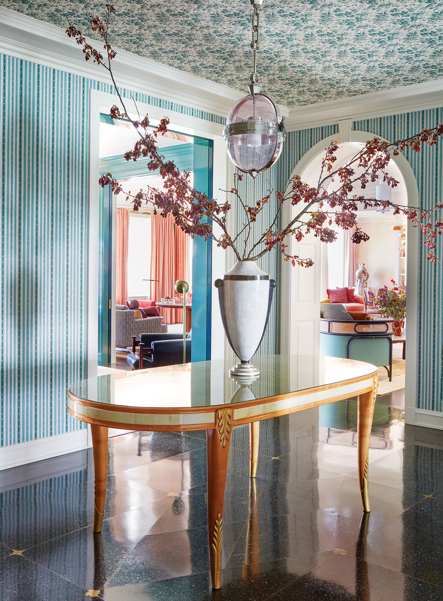Foyer with vase of cherry blossom branches