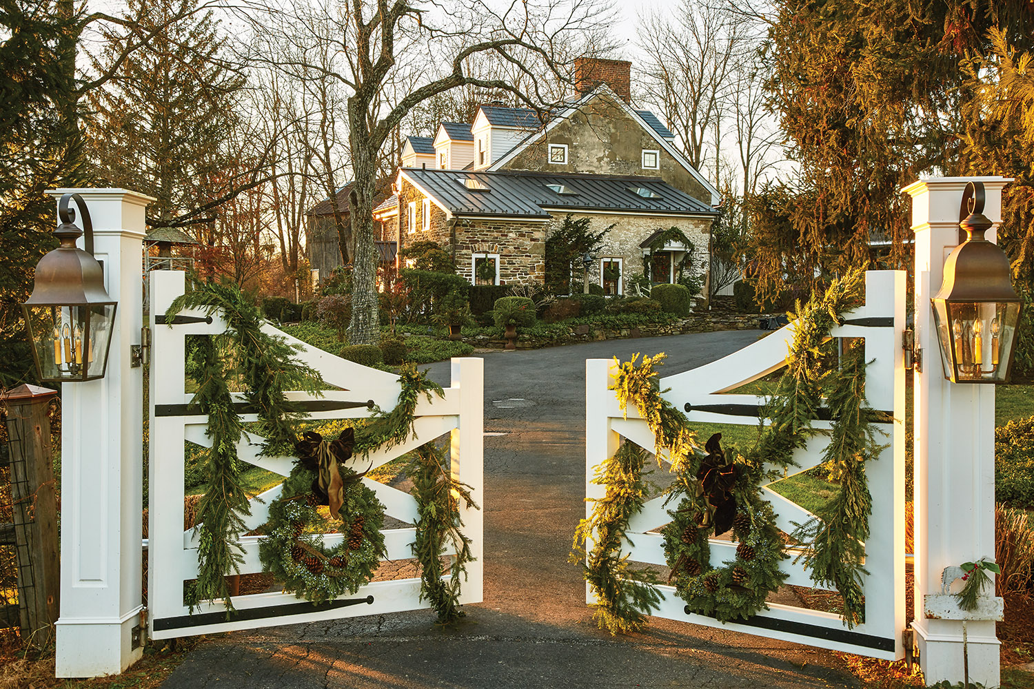 entrance gate decorated with holiday wreaths