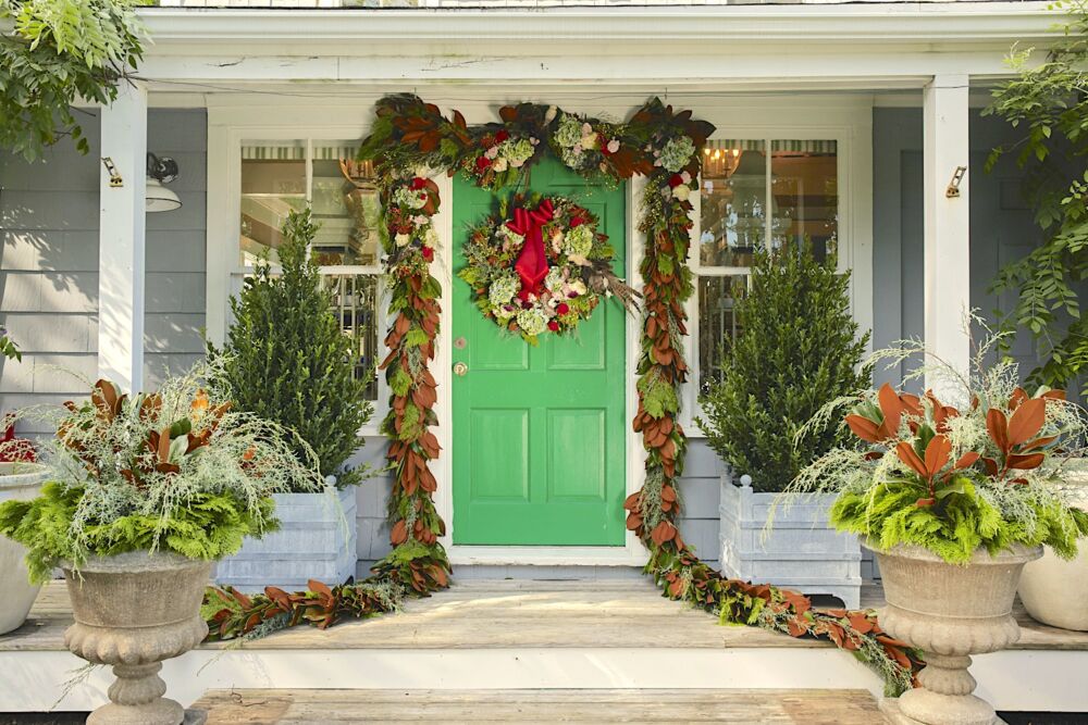 Michael Giannelli's front door decorated for Christmas with a wreath and garland.