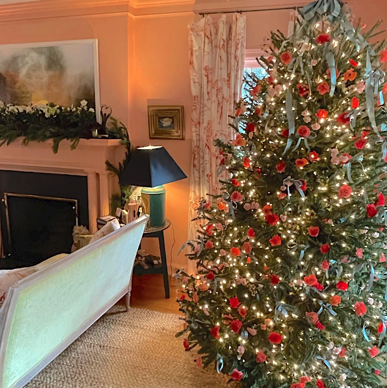 Margot Shaw's 2022 Christmas tree decorated with pink and coral carnations, roses, and hypericum.