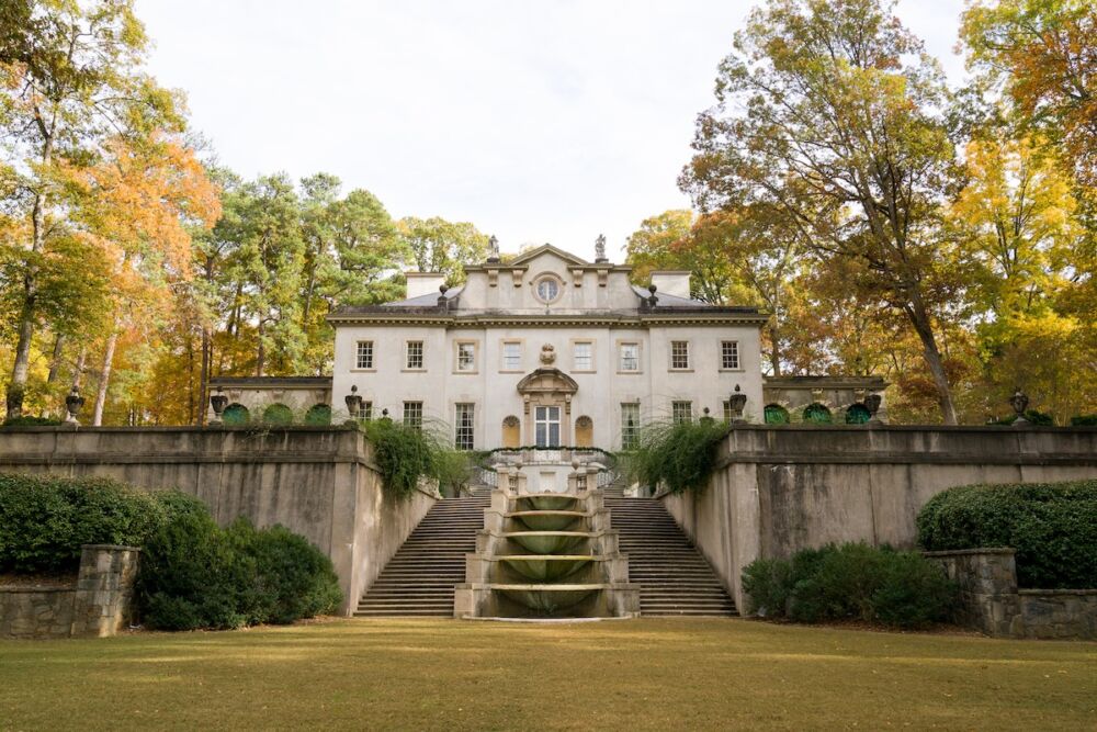 Autumn lawn with steps leading up to the Swan House in Atlanta, GA.