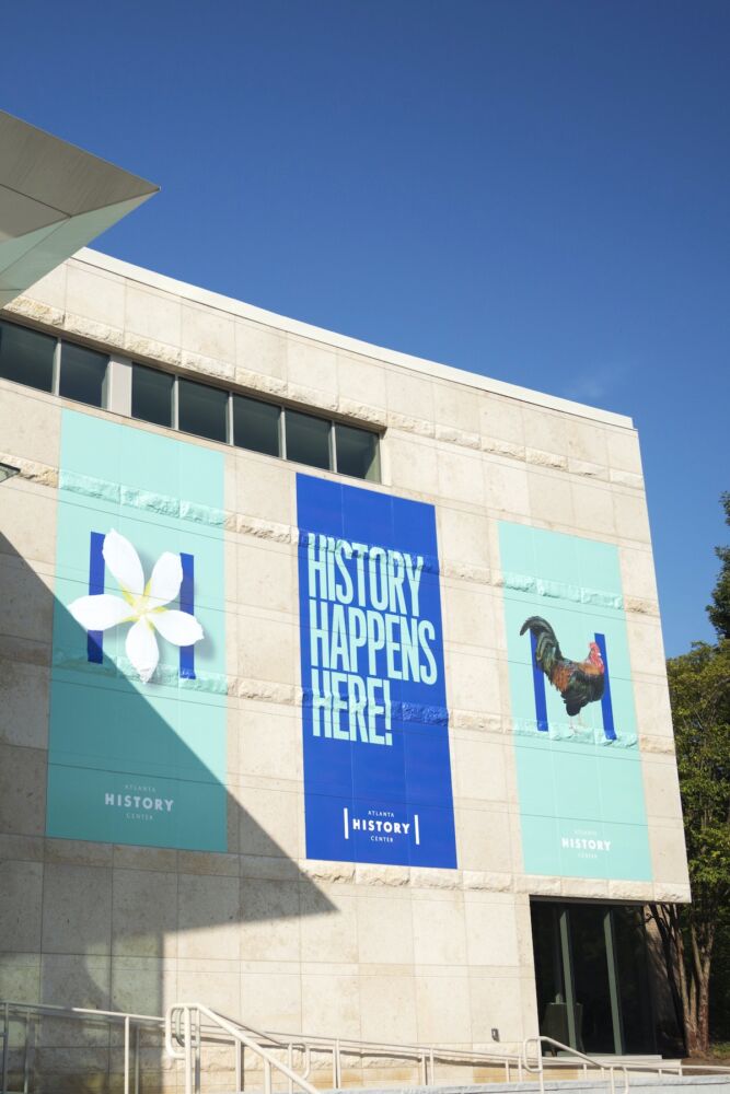 Blue banners over main entrance of the Atlanta History Center.