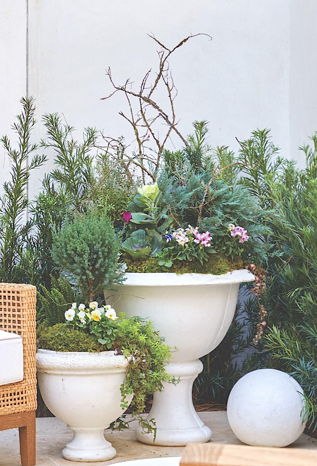 Pair of planters on terrace level patio with plantings designed by Atlanta Planters.